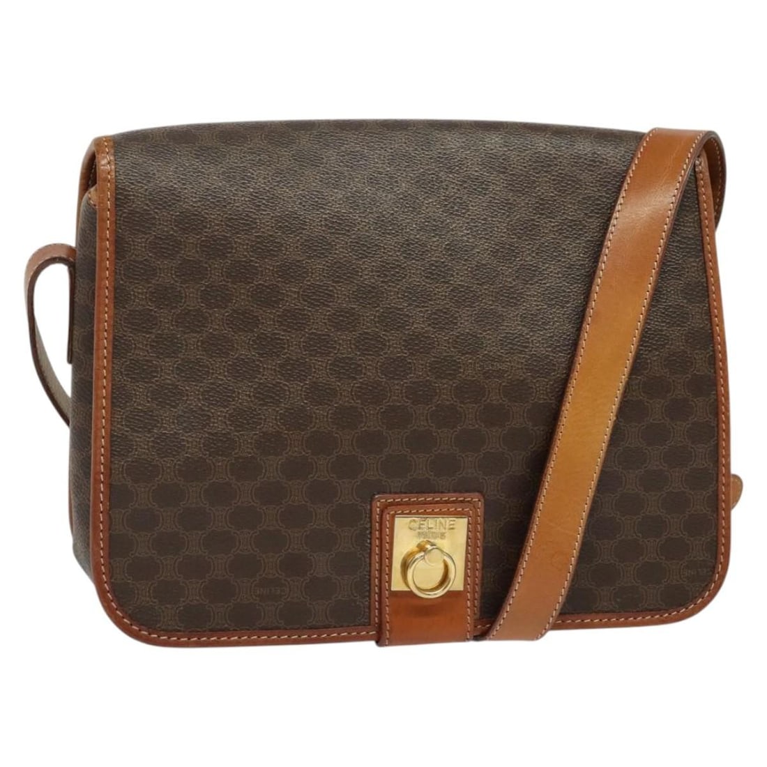 CELINE Macadam Shoulder Bag Brown PVC Leather Gold Tone Italy: CELINE Macadam Shoulder Bag Brown PVC Leather Gold Tone Italy A CELINE shoulder bag crafted from PVC leather and Macadam canvas in brown and gold. It features a shoulder drop of approximately 50 to 55