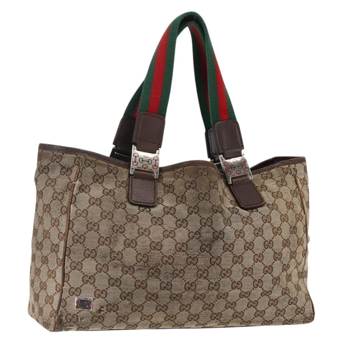 Beige GG Canvas Web Sherry Line Tote by Gucci Model 145758: Beige GG Canvas Web Sherry Line Tote by Gucci Model 145758 This is a Gucci GG Canvas Web Sherry Line tote bag in beige, silver, and red. The bag features GG canvas exterior material with signature web