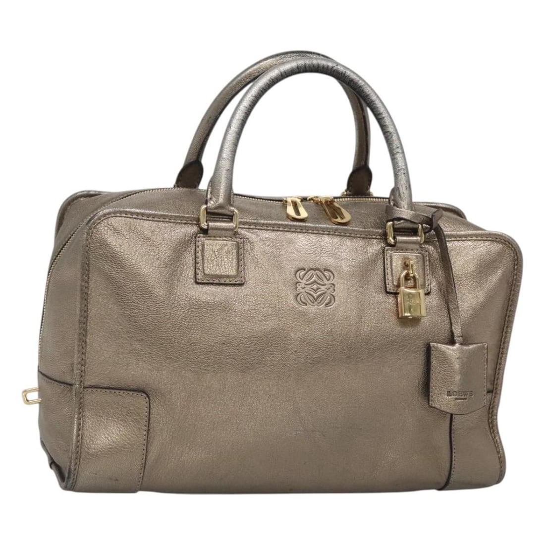 LOEWE Amazona 36 Gold Tone Leather Handbag: LOEWE Amazona 36 Gold Tone Leather Handbag This LOEWE Anagram Amazona 36 hand bag is crafted from leather in a gold tone and features dual top handles. The bag includes a dust bag, padlock, two keys, 