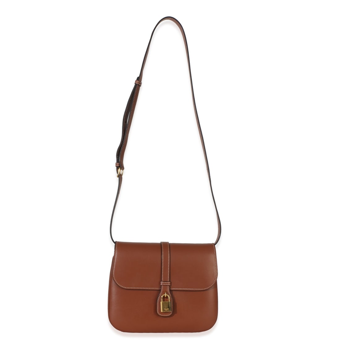 Celine Tabou Medium Shoulder Bag Tan Smooth Calfskin Leather: Celine Tabou Medium Shoulder Bag Tan Smooth Calfskin Leather This Celine Tabou Medium Flap Bag is crafted from tan smooth calfskin leather with a structured silhouette. It features a snap closure, gol