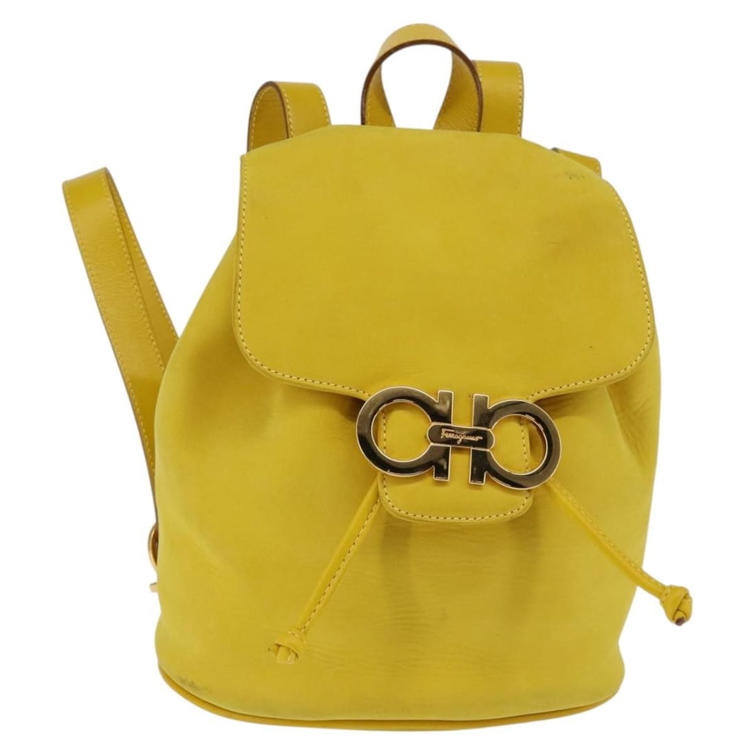 Salvatore Ferragamo Gancini Suede Backpack Yellow Gold Authentic: Salvatore Ferragamo Gancini Suede Backpack Yellow Gold Authentic This Salvatore Ferragamo Gancini Backpack combines luxury and functionality, crafted in Italy from premium suede in a striking yellow a