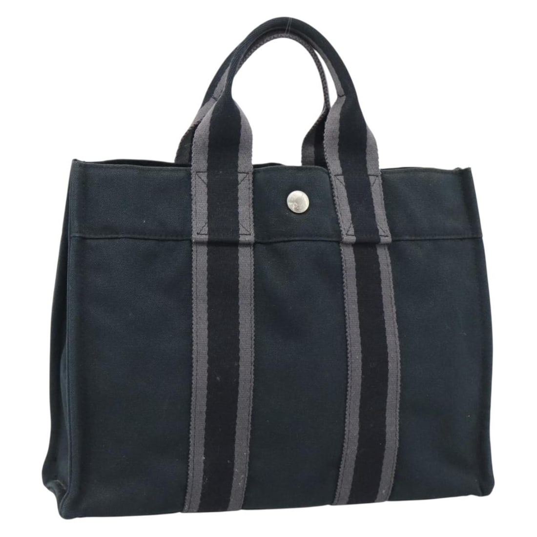Hermes Fourre Tout PM Black Canvas Handbag Silver Tone: Hermes Fourre Tout PM Black Canvas Handbag Silver Tone Hermes Fourre Tout PM hand bag in black and silver canvas, made in France. The item is heavily used and shows visible wear, including loss of sha