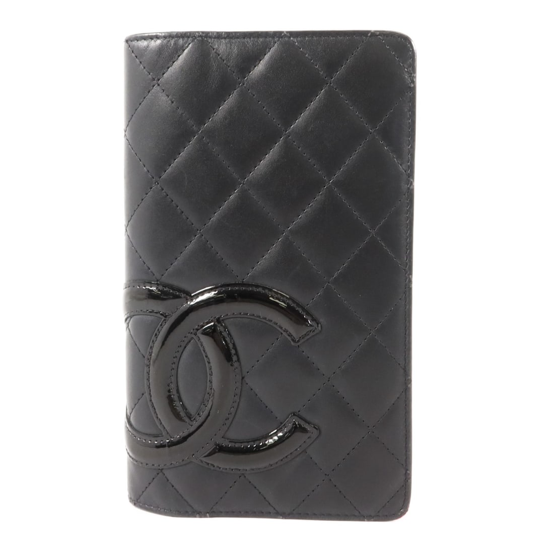 CHANEL Cambon A26717 bifold wallet in black calfskin: CHANEL Cambon A26717 bifold wallet in black calfskin CHANEL Cambon long bifold wallet in black calfskin (cowhide) leather. It features a black frame color, a bifold purse style, and is identified with