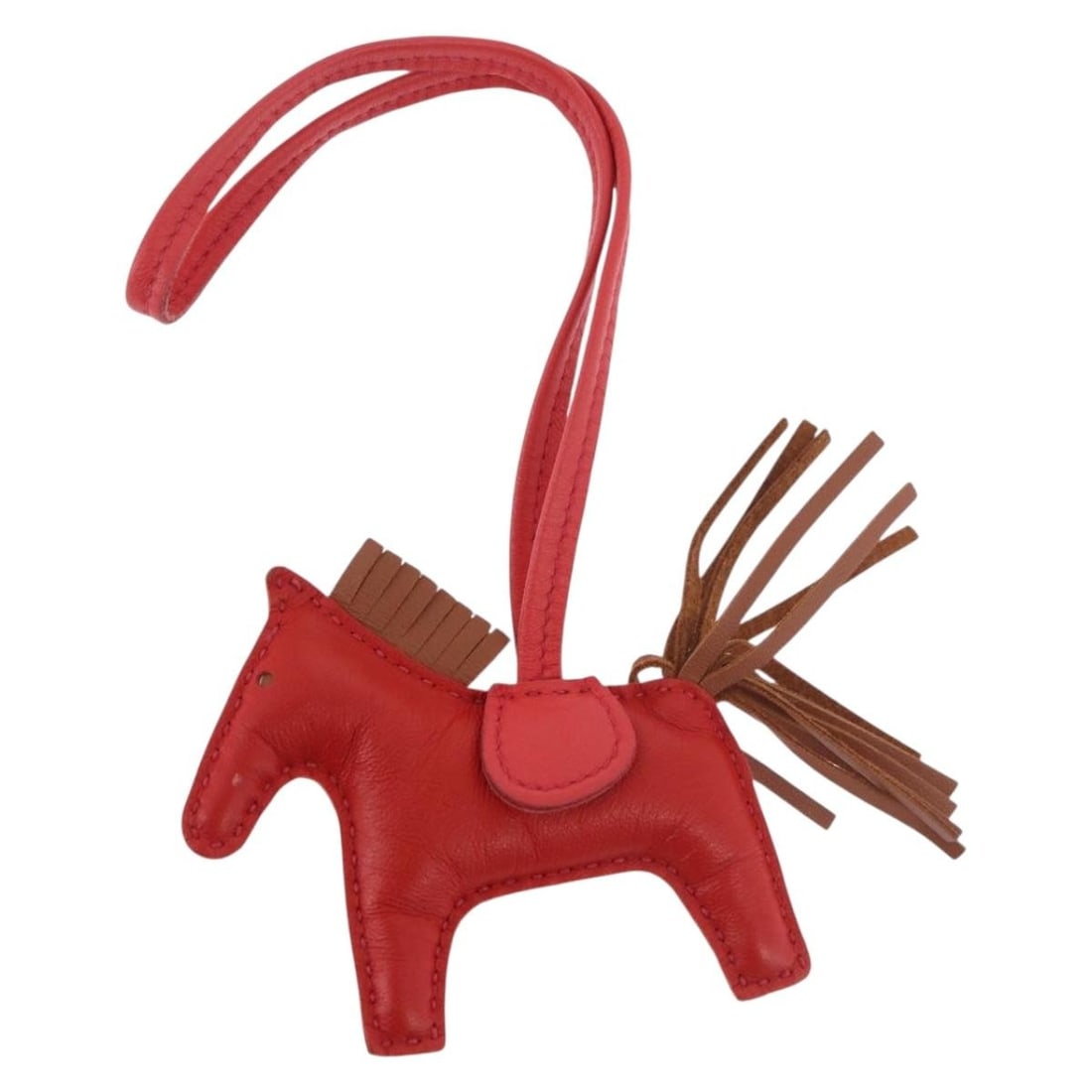 HERMES PM Rodeo Leather Charm Red with Box: HERMES PM Rodeo Leather Charm Red with Box Hermes Rodeo PM leather charm in red, made in France. The item comes with its box and is described as heavily used, with surface rubbing and slight staining 