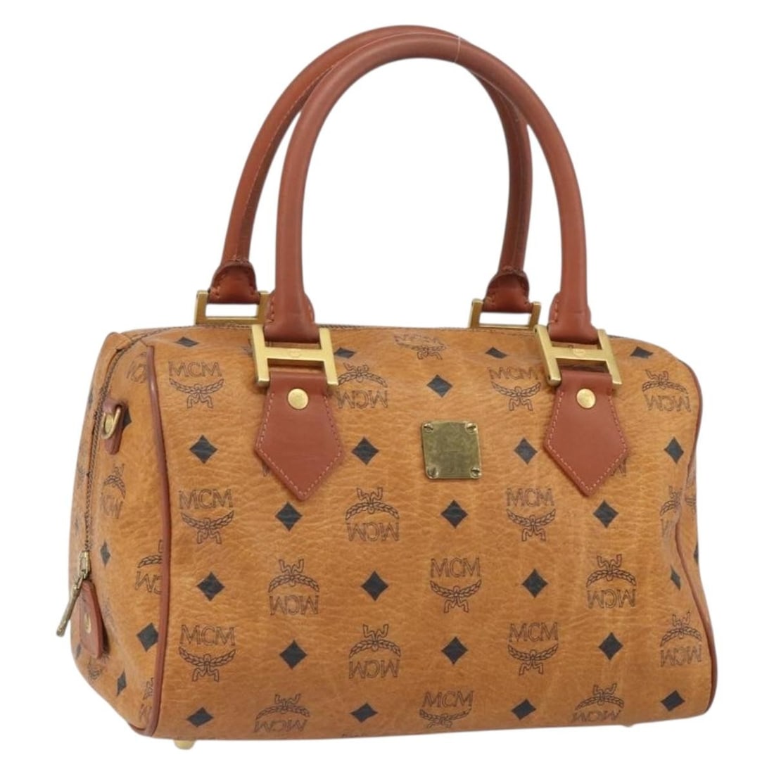 Brown PVC Leather Boston Bag by MCM with Gold Accents: Brown PVC Leather Boston Bag by MCM with Gold Accents This is an MCM Boston bag crafted from brown and gold PVC leather. Made in Italy, it features a classic logogram design and gold-tone detailing. T