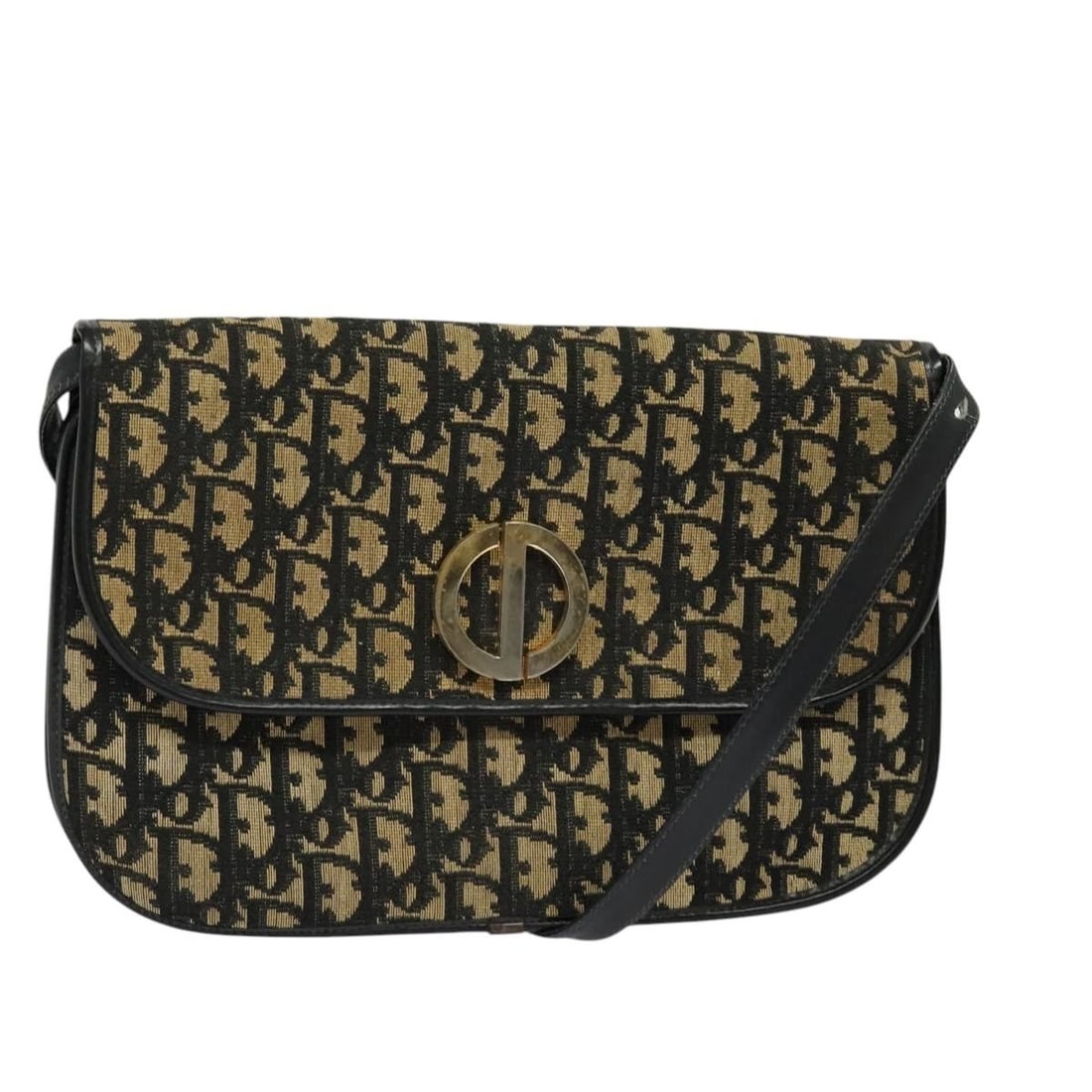 Christian Dior Trotter shoulder bag in navy and gold canvas: Christian Dior Trotter shoulder bag in navy and gold canvas Christian Dior shoulder bag in navy and gold Trotter canvas, made in France. This women's bag includes the item shown in the photo only; ite