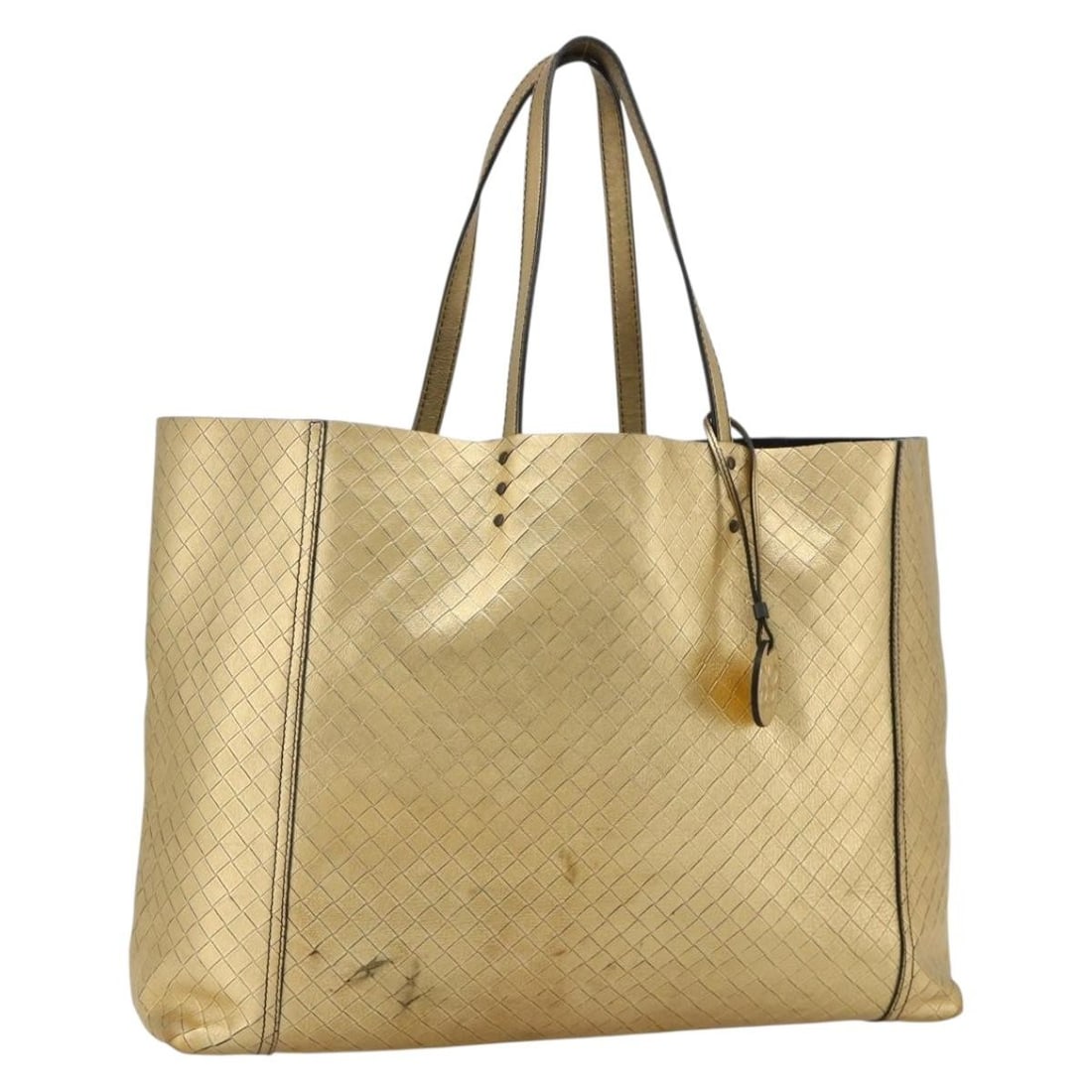 Bottega Veneta Intrecciato Leather Tote in Gold: Bottega Veneta Intrecciato Leather Tote in Gold Bottega Veneta Intrecciato tote bag in gold leather, made in Italy. This women's tote is offered without the original box or dust bag; only the item sho