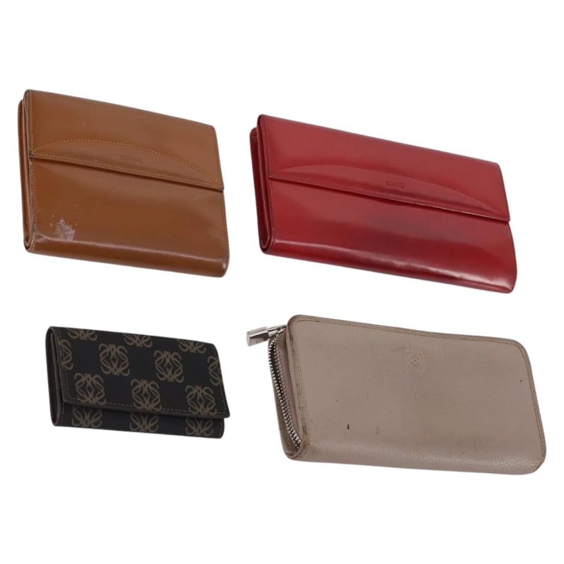 Authentic LOEWE Leather Wallet 4Set Beige Red Black: Authentic LOEWE Leather Wallet 4Set Beige Red Black This stylish LOEWE wallet set includes four distinct pieces crafted from high-quality leather in a striking combination of beige, red, and black. Th