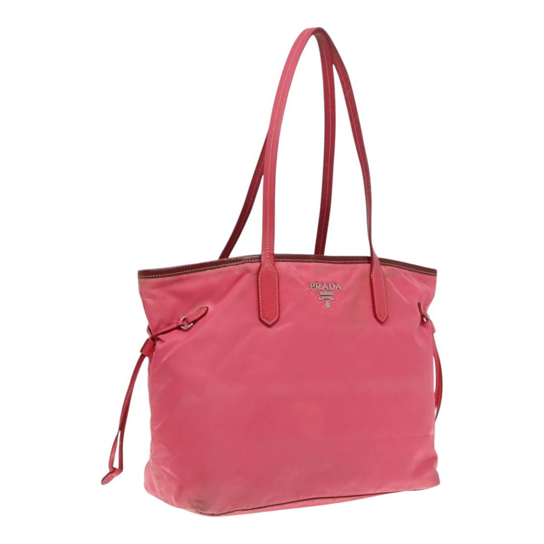 Pink Nylon Tote for Women by Prada with Silver Accents: Pink Nylon Tote for Women by Prada with Silver Accents This PRADA tote bag is crafted from pink nylon with silver accents and is designed for women. Made in Italy, the bag features a spacious interior