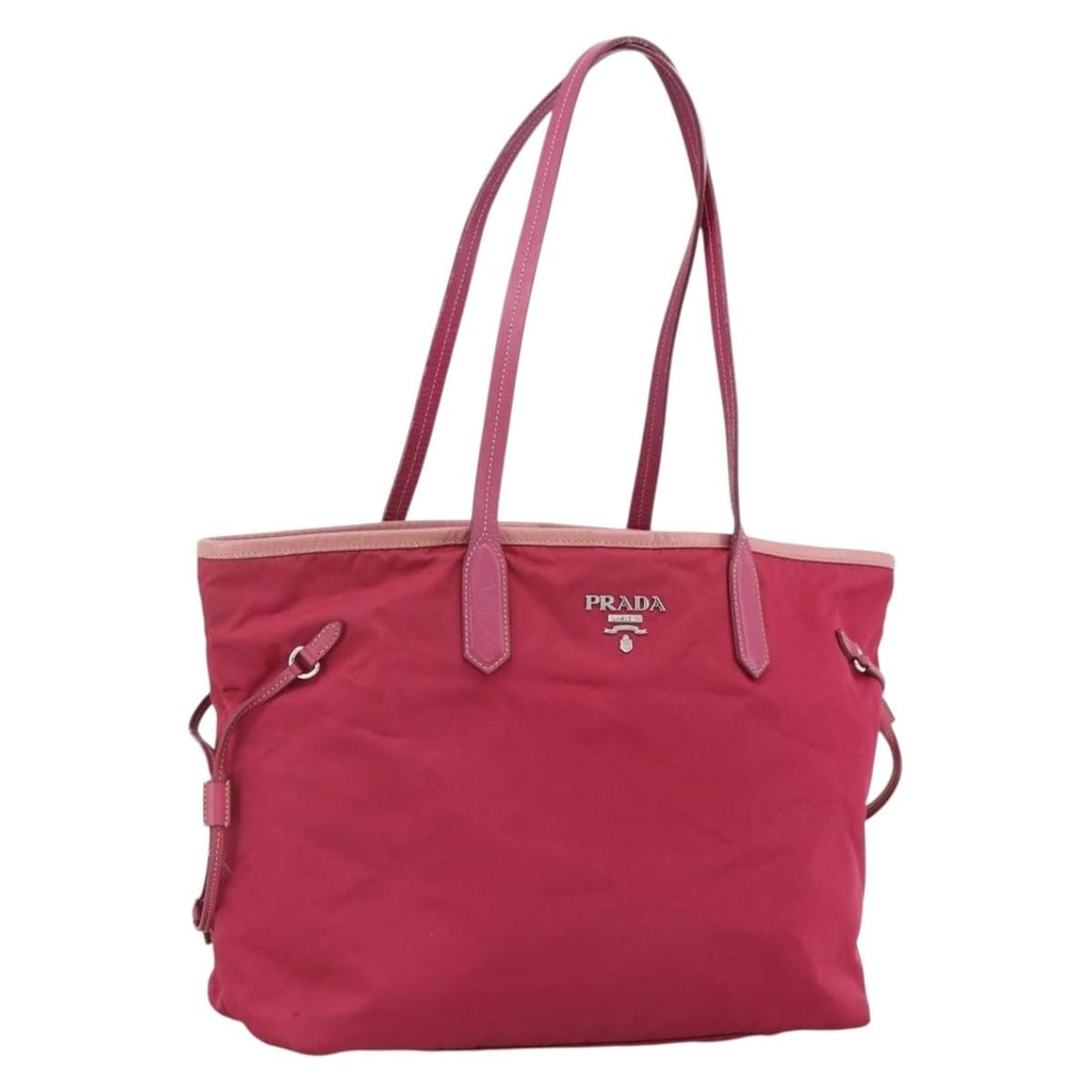Prada pink silver nylon tote bag Italy 12.6 inch: Prada pink silver nylon tote bag Italy 12.6 inch This PRADA tote bag features a pink and silver nylon exterior with silver-tone hardware. Designed for women, it offers a spacious interior and practica