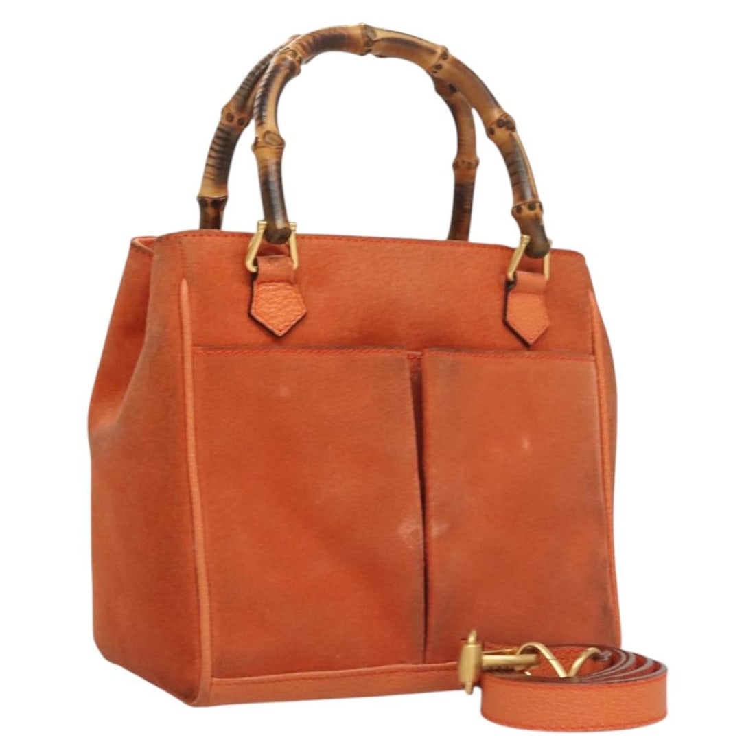 Gucci Bamboo suede orange gold handbag with shoulder strap: Gucci Bamboo suede orange gold handbag with shoulder strap This Gucci Bamboo Hand Bag is crafted from orange and gold suede and offers versatile styling with both top handles and a detachable shoulder