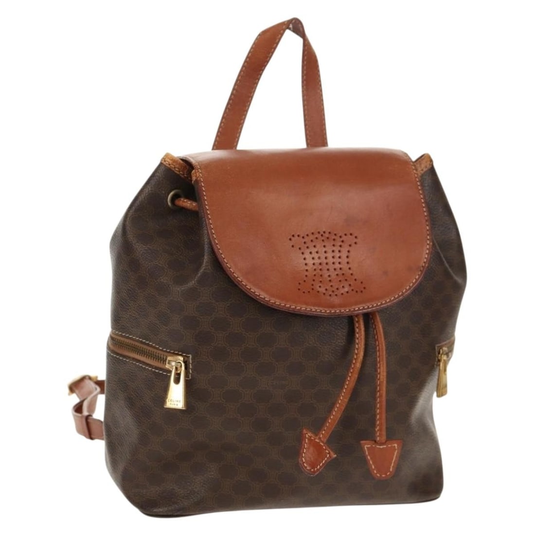 CELINE Macadam Backpack Brown PVC Leather Gold Tone Made in Italy: CELINE Macadam Backpack Brown PVC Leather Gold Tone Made in Italy This CELINE Macadam Canvas Backpack is crafted in PVC leather and Macadam canvas with a brown and gold color scheme. Made in Italy, it