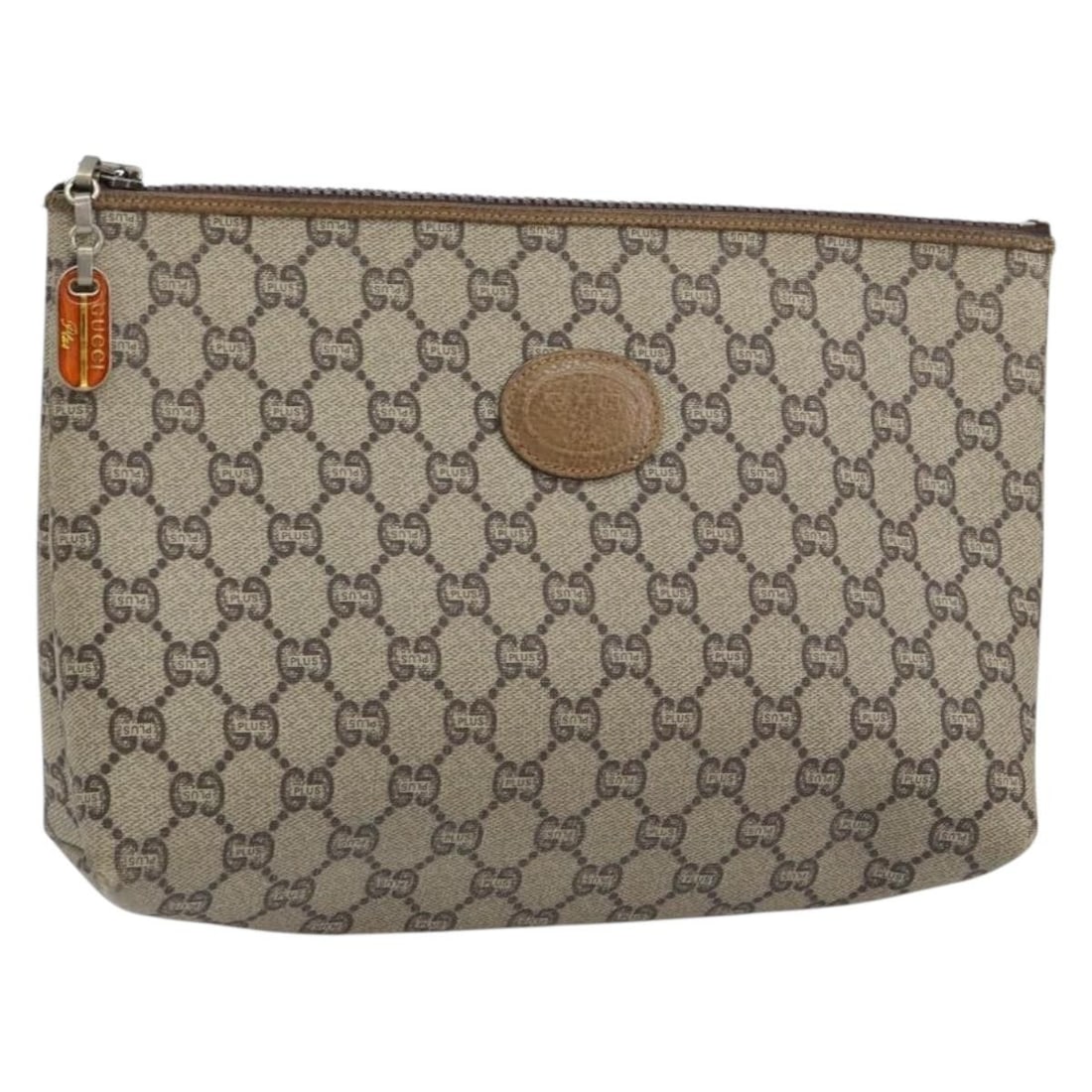 GUCCI GG Plus Supreme Clutch Bag Beige Gold PVC Authentic: GUCCI GG Plus Supreme Clutch Bag Beige Gold PVC Authentic This authentic GUCCI GG Plus Supreme Clutch Bag showcases a stylish combination of beige PVC leather and gold GG canvas. Designed in Italy, th