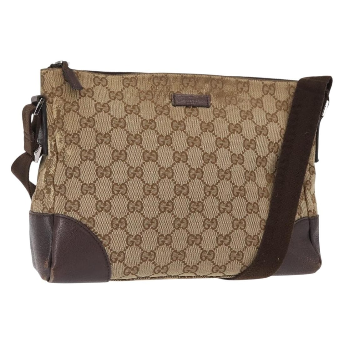 Beige Silver GG Canvas Shoulder Bag by Gucci Model 114273 Italy: Beige Silver GG Canvas Shoulder Bag by Gucci Model 114273 Italy This is a pre-owned Gucci GG Canvas shoulder bag in beige and silver tones. Crafted in Italy, the bag features a GG canvas exterior and 