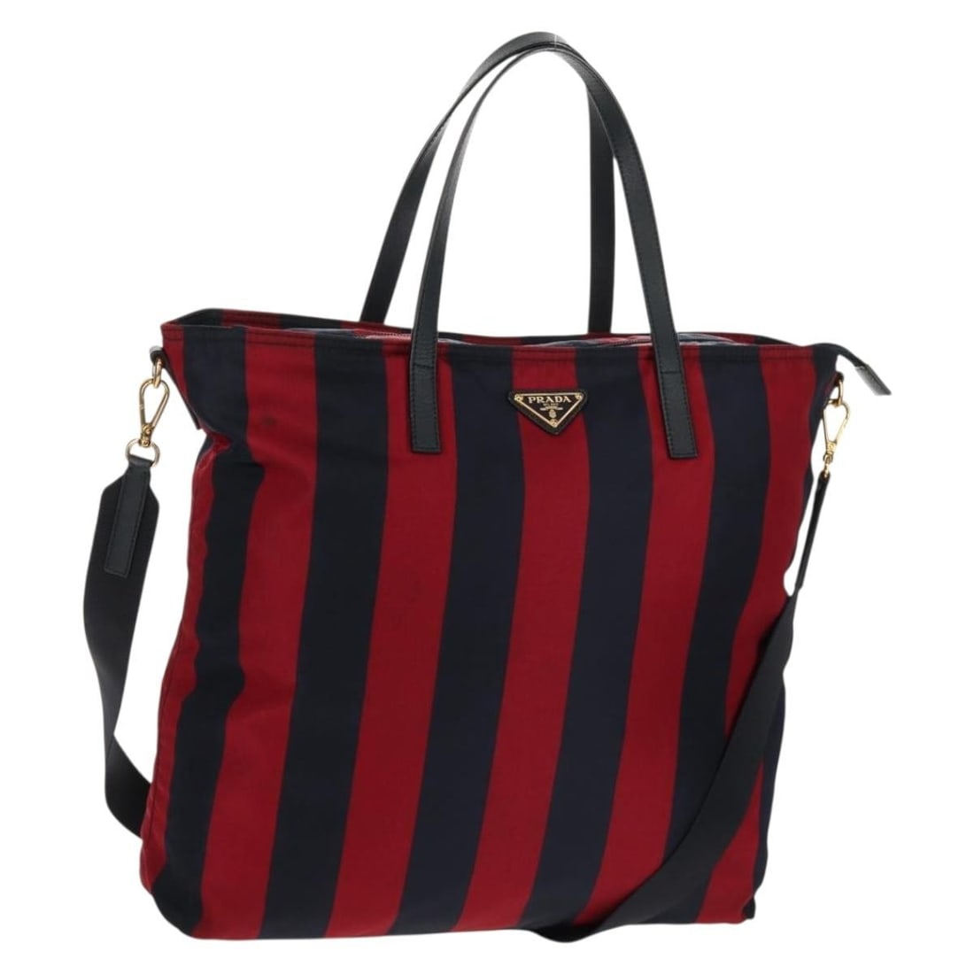 Prada Nylon Red Navy Tote with Shoulder Strap: Prada Nylon Red Navy Tote with Shoulder Strap This PRADA tote bag features a versatile 2-way design crafted from durable nylon in red, navy, and gold tones. Designed for women, it includes both handle