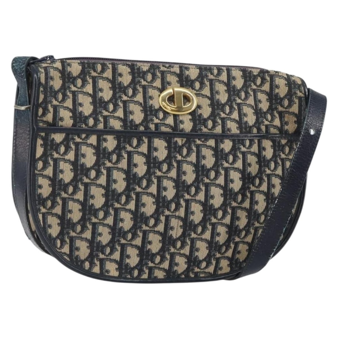 Christian Dior Trotter Shoulder Bag in Navy Canvas Gold Tone: Christian Dior Trotter Shoulder Bag in Navy Canvas Gold Tone Christian Dior shoulder bag crafted in Trotter Canvas with a navy and gold color scheme. Made in France, this women's bag measures approxim