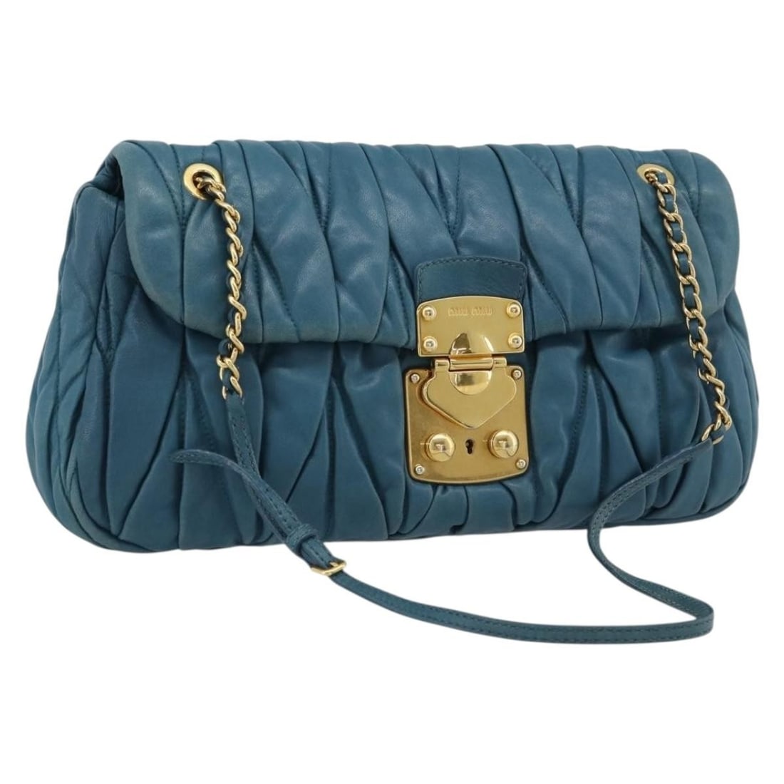 Miu Miu leather shoulder bag in blue with gold tone chain: Miu Miu leather shoulder bag in blue with gold tone chain A Miu Miu Matelasse chain shoulder bag in blue leather with gold-tone accents. It comes with one key and a clochette, and was made in Turkey. 