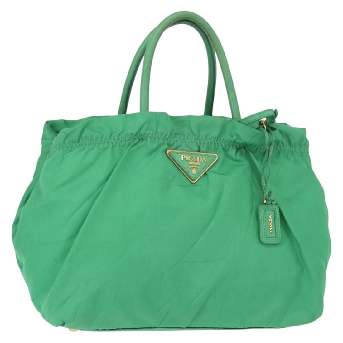 PRADA Nylon Hand Bag in Green with Gold Tone: PRADA Nylon Hand Bag in Green with Gold Tone Prada women's handbag in green nylon with gold-tone accents, made in Italy. This heavily used bag shows visible wear throughout, including loss of shape, r