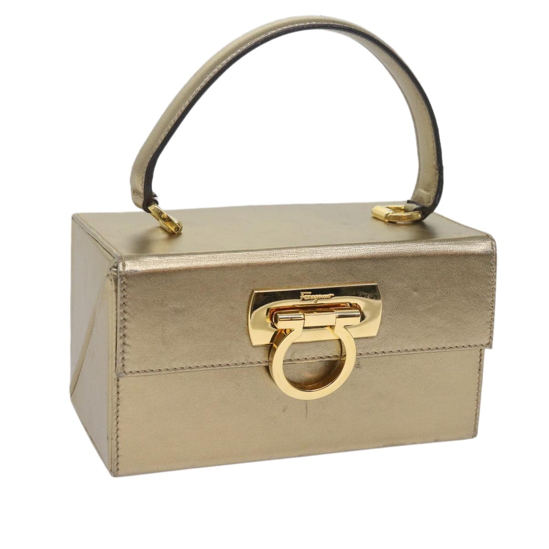 Salvatore Ferragamo Gancini Leather Handbag Gold Tone Italy: Salvatore Ferragamo Gancini Leather Handbag Gold Tone Italy Salvatore Ferragamo Gancini hand bag in leather with a gold tone exterior. This women's bag was made in Italy and measures approximately 43 