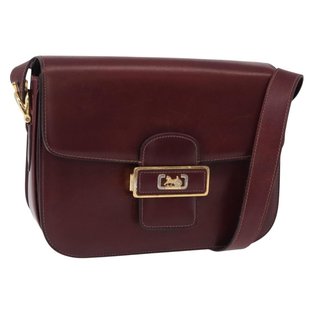 CELINE Horse Carriage Leather Shoulder Bag Bordeaux Gold Tone Italy: CELINE Horse Carriage Leather Shoulder Bag Bordeaux Gold Tone Italy A CELINE Horse Carriage shoulder bag in bordeaux with gold tone accents, crafted from leather and made in Italy. The bag measures ap