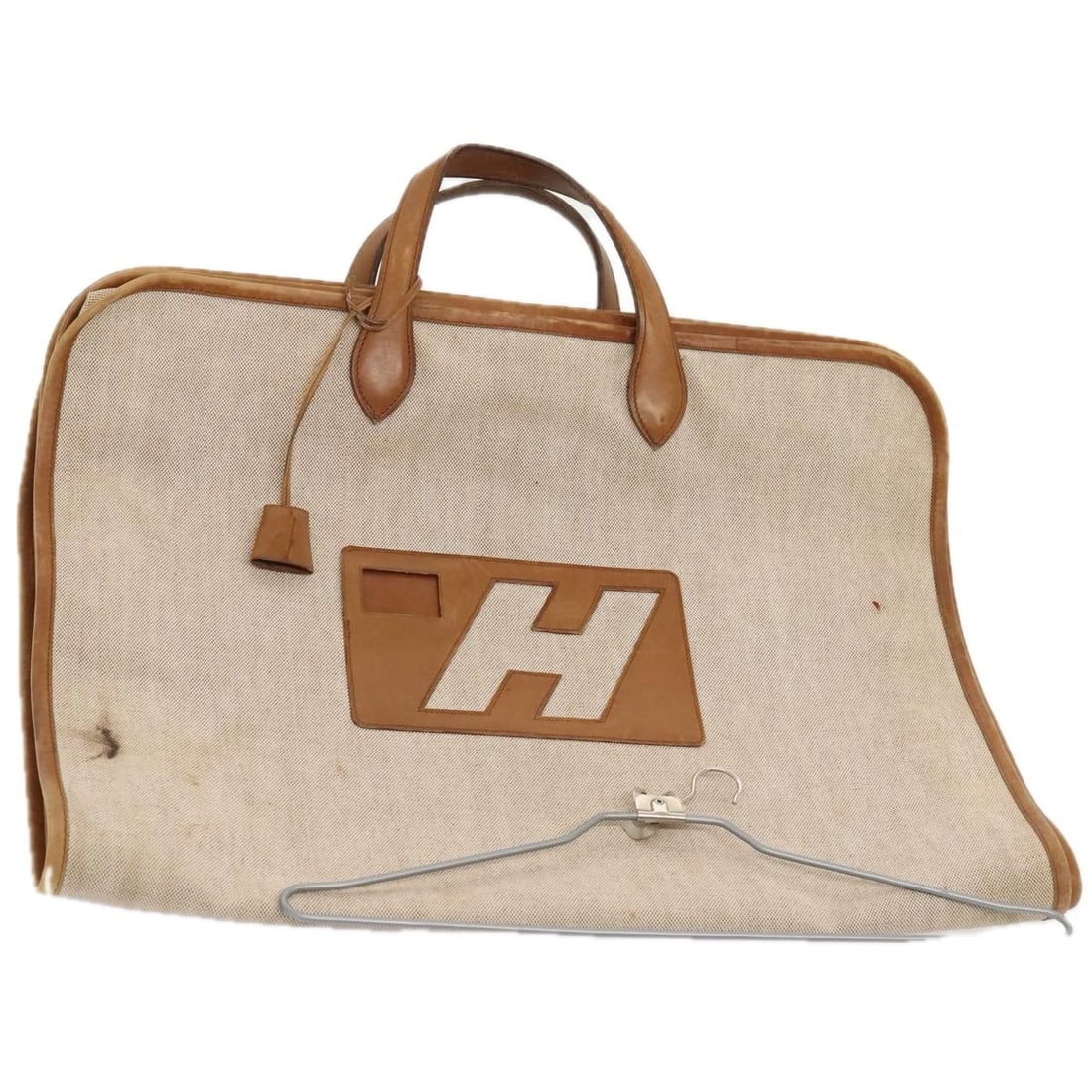 Hermes beige canvas garment cover with keys and clochette: Hermes beige canvas garment cover with keys and clochette This Hermes garment cover is crafted from beige canvas with leather accents, designed for women's use. Made in France, it features a spacious 