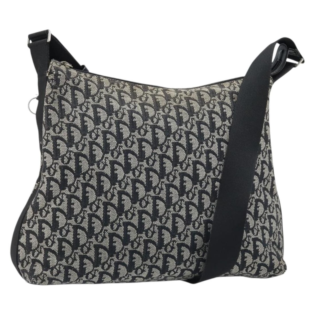 Christian Dior Trotter Shoulder Bag in Navy Canvas with Silver Tone Hardware: Christian Dior Trotter Shoulder Bag in Navy Canvas with Silver Tone Hardware A Christian Dior shoulder bag in navy and silver Trotter canvas. It features a shoulder strap and comes with a guarantee ca
