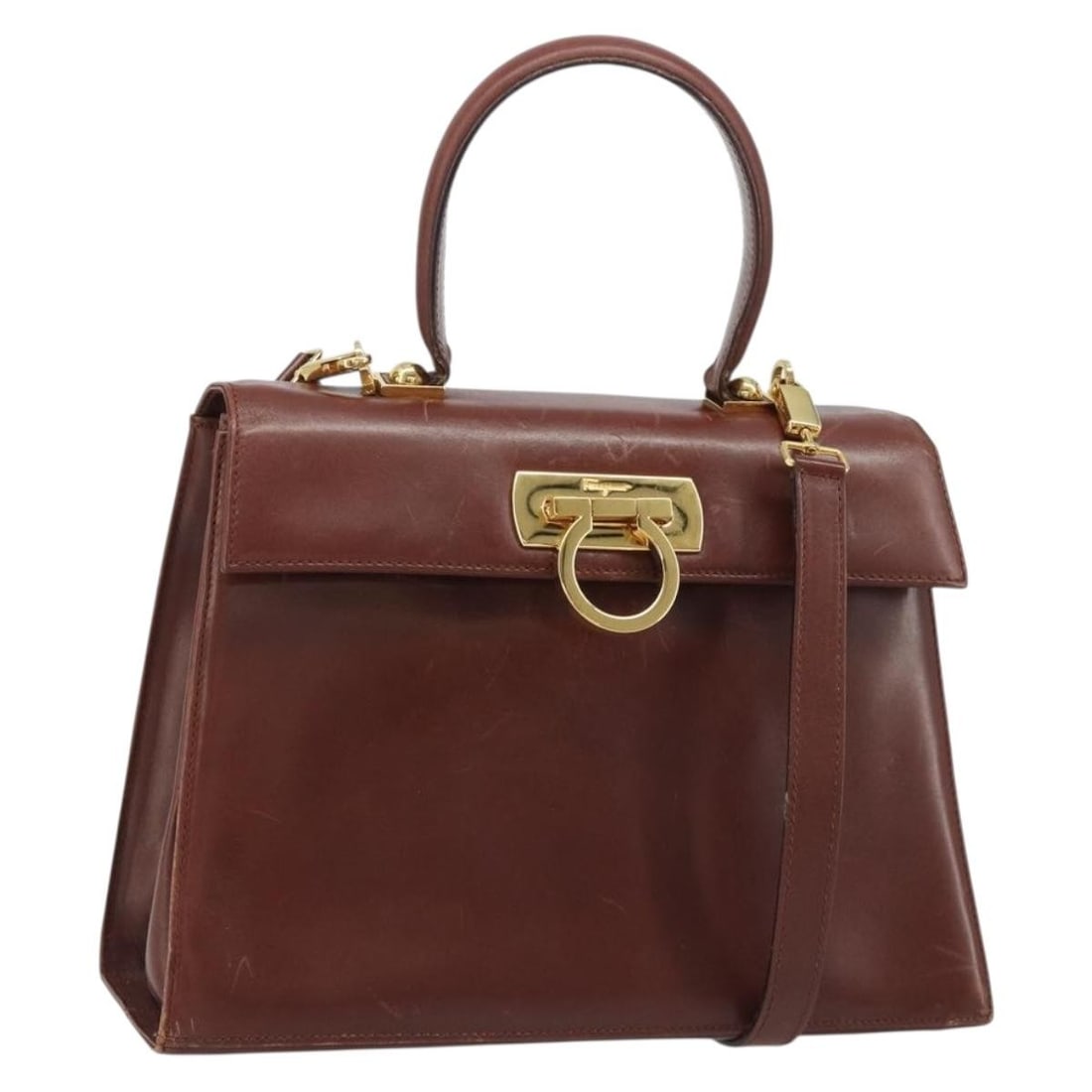Leather 2way handbag Salvatore Ferragamo Gancini brown with shoulder strap: Leather 2way handbag Salvatore Ferragamo Gancini brown with shoulder strap Salvatore Ferragamo Gancini leather 2-way handbag in brown and gold, made in Italy. It comes with a shoulder strap and featur