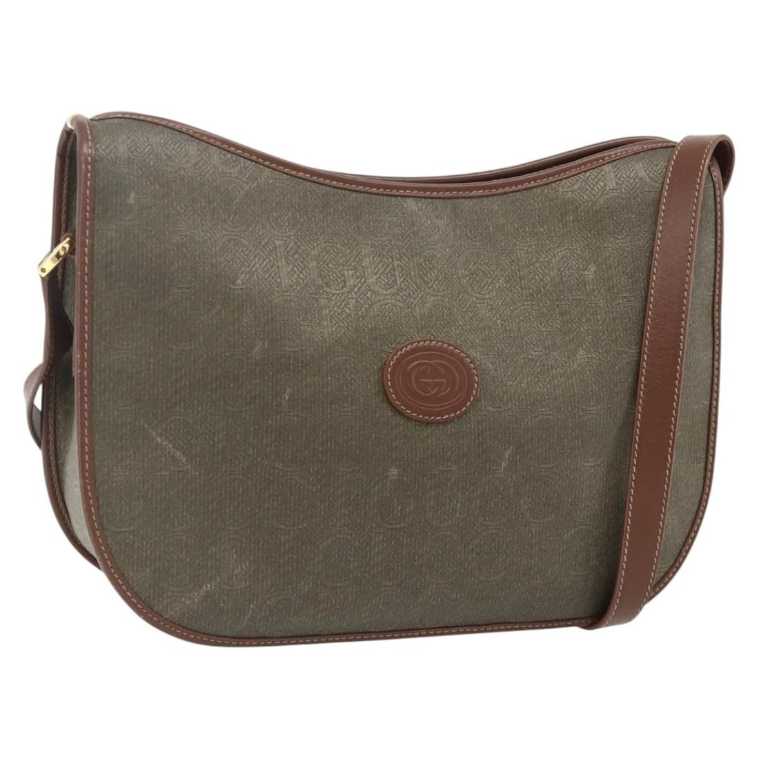 Gucci beige gold canvas women s shoulder bag Italy: Gucci beige gold canvas women s shoulder bag Italy This GUCCI shoulder bag is crafted from beige and gold canvas, offering a stylish and versatile accessory for women. Made in Italy, it features a spa