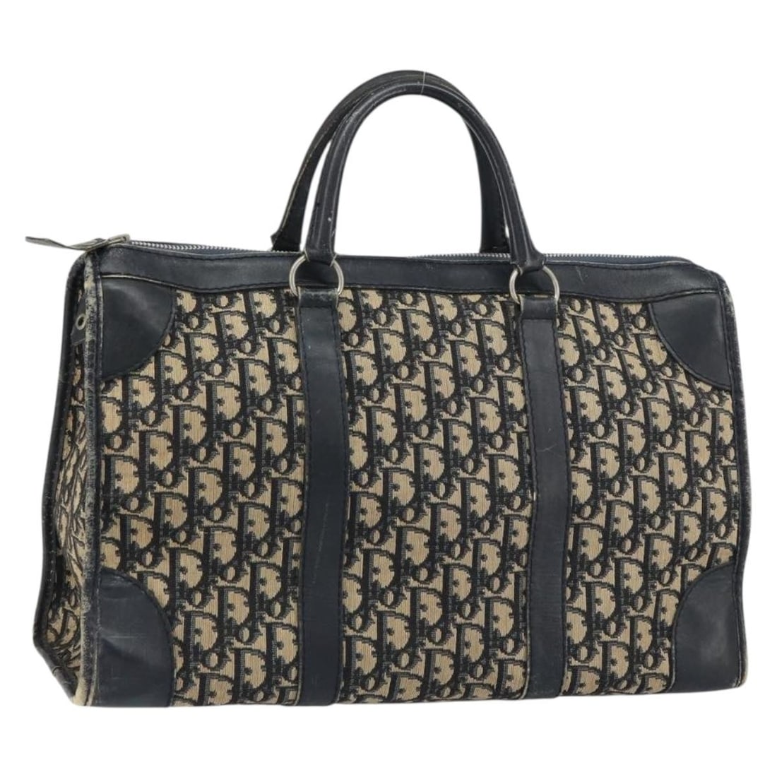 Navy Trotter Canvas Boston Bag by Christian Dior France Silver Accents: Navy Trotter Canvas Boston Bag by Christian Dior France Silver Accents This Christian Dior Boston Bag features the iconic Trotter canvas in navy and silver tones. Crafted in France, the bag is styled 