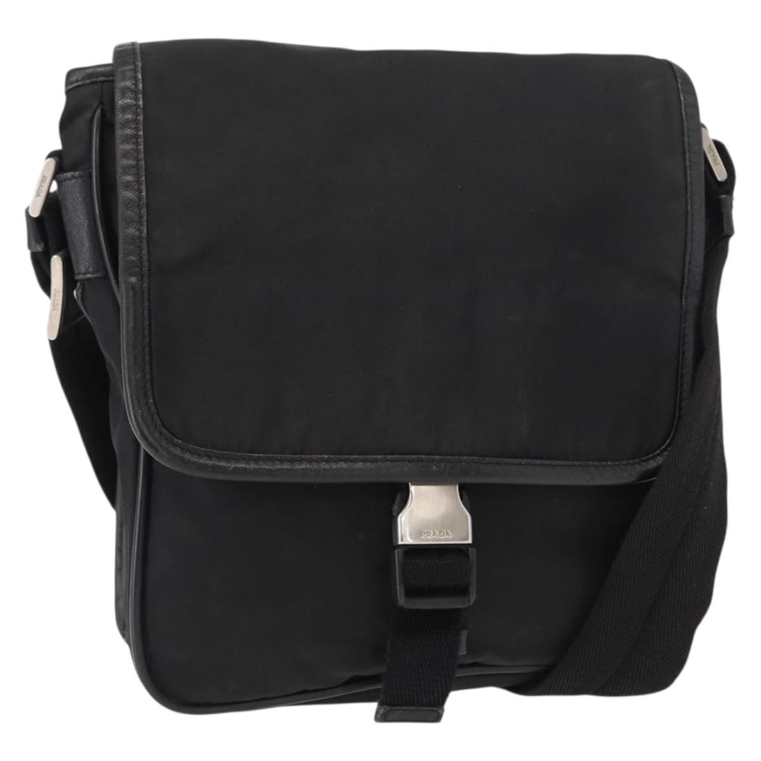 PRADA Black Silver Nylon Shoulder Bag Auth Italy: PRADA Black Silver Nylon Shoulder Bag Auth Italy This authentic PRADA shoulder bag is crafted from durable nylon in a sleek black and silver color scheme. Featuring a practical design, it offers ample