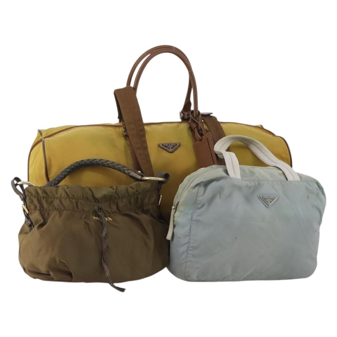 PRADA nylon handbag 3-piece bundle khaki blue with guarantee card: PRADA nylon handbag 3-piece bundle khaki blue with guarantee card PRADA Boston hand bag in khaki and blue nylon, made in Italy. This special bundle offer includes a guarantee card. The item is ranked 