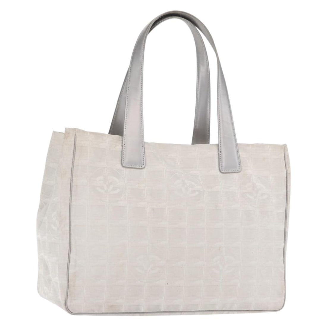 Chanel Silver Nylon Travel Line Tote Bag with CC Logo: Chanel Silver Nylon Travel Line Tote Bag with CC Logo This CHANEL Travel Line tote bag is crafted from silver nylon and features the iconic CC logo. Designed for women, the bag offers ample space with