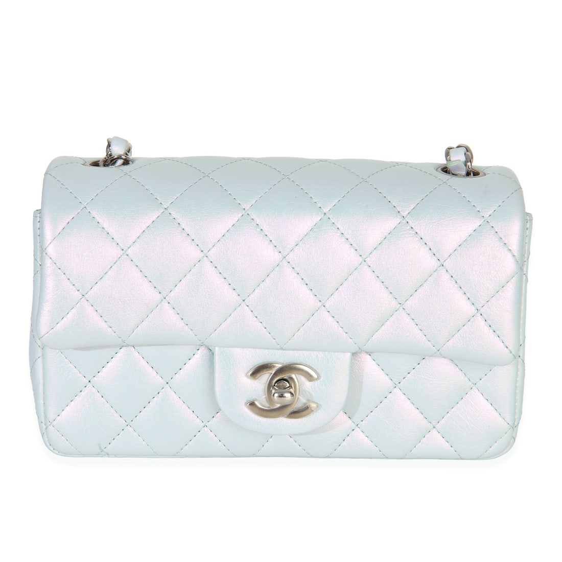 Chanel Blue Iridescent Goatskin Mini Flap Crossbody Bag: Chanel Blue Iridescent Goatskin Mini Flap Crossbody Bag This Chanel Rectangular Mini Flap bag is crafted from blue iridescent quilted goatskin leather, featuring a turnlock closure and silver-tone har