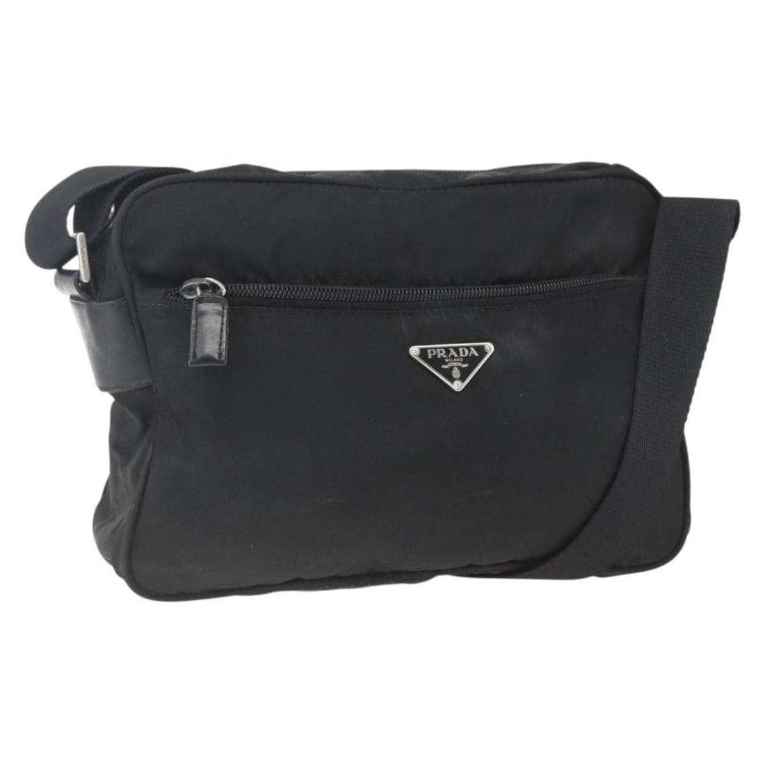 Prada Black Nylon Italian Shoulder Bag Silver Tone Details: Prada Black Nylon Italian Shoulder Bag Silver Tone Details This PRADA shoulder bag features a black nylon exterior with silver-tone accents. Made in Italy, it offers a versatile design with an adjusta