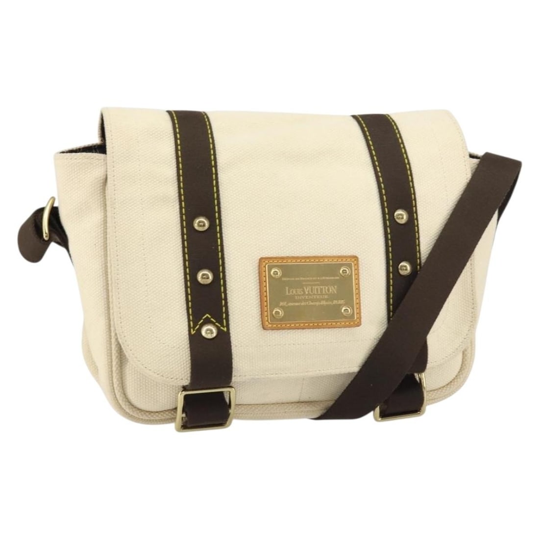 Louis Vuitton Antigua Buzzus PM Canvas Shoulder Bag Beige Brown M40042: Louis Vuitton Antigua Buzzus PM Canvas Shoulder Bag Beige Brown M40042 This Louis Vuitton Antigua Buzzus PM shoulder bag is crafted from beige and brown canvas and features a spacious main compartment