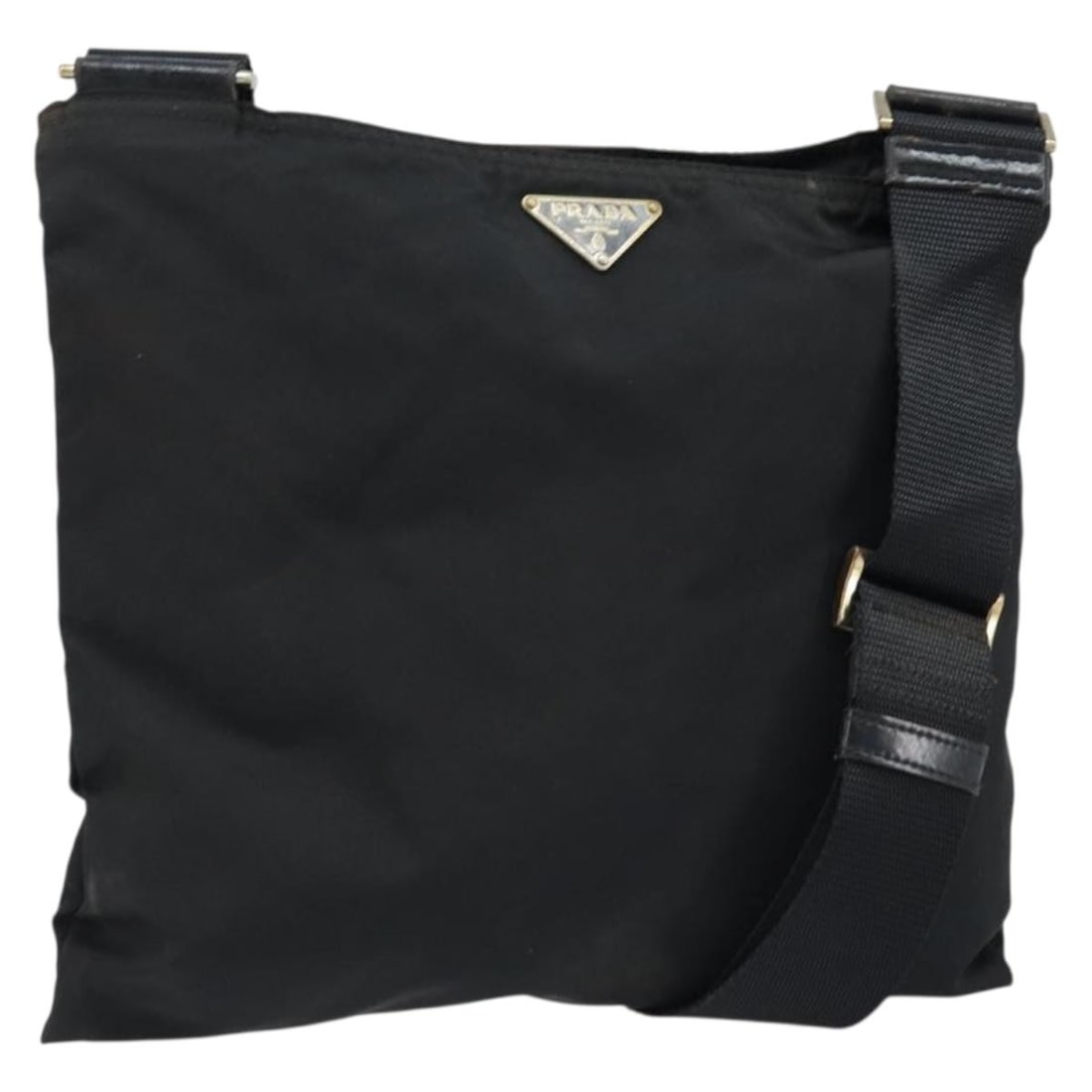 PRADA Black Nylon Womens Shoulder Bag Made in Italy: PRADA Black Nylon Womens Shoulder Bag Made in Italy Authentic Prada shoulder bag in black nylon with an adjustable shoulder strap. Made in Italy, this women's bag shows heavy use with visible wear thr