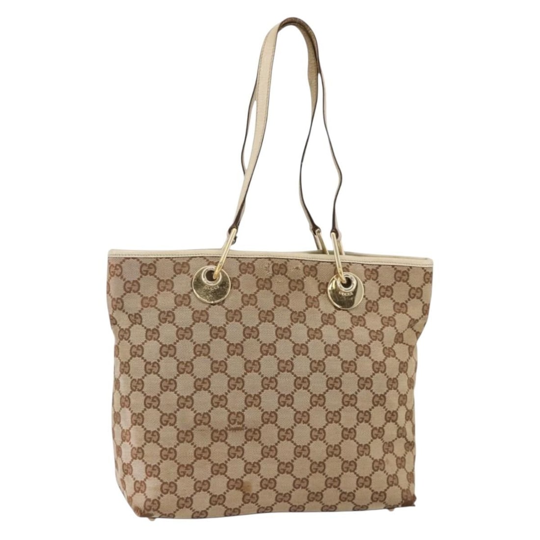 Beige Gold GG Canvas Gucci Handbag Model 139552 for Women: Beige Gold GG Canvas Gucci Handbag Model 139552 for Women This is a Gucci GG Canvas hand bag in beige and gold, designed for women. Crafted in Italy, the bag features the iconic GG canvas exterior and