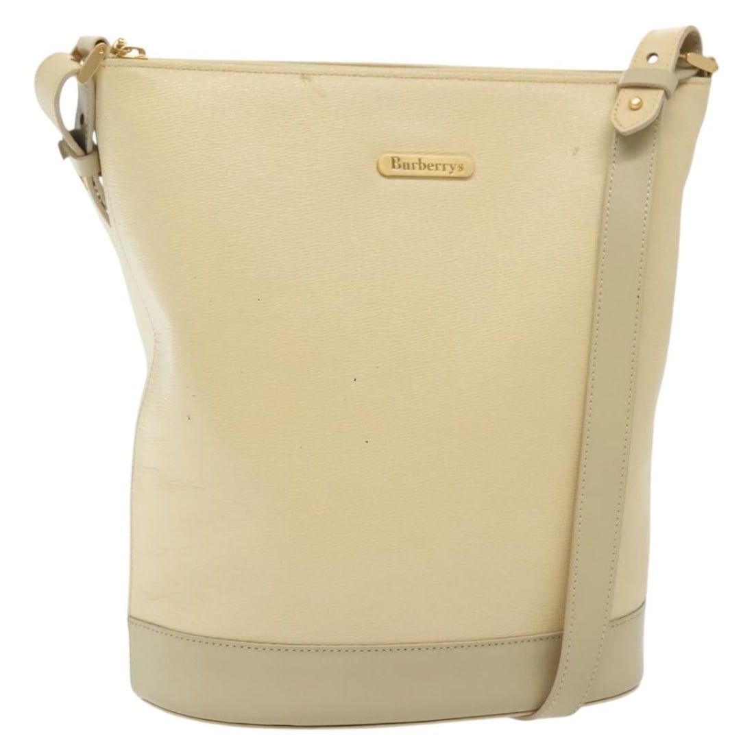 Burberrys Leather Shoulder Bag Beige Gold Vintage Design: Burberrys Leather Shoulder Bag Beige Gold Vintage Design This Burberrys shoulder bag is crafted from high-quality leather in a stylish beige and gold color combination. The bag measures approximately 