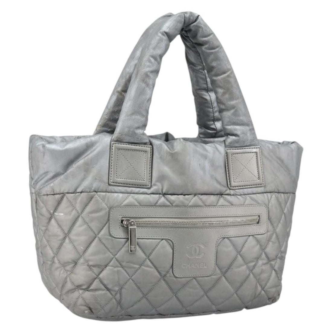 CHANEL Cococoon Nylon Handbag Silver with Guarantee Card: CHANEL Cococoon Nylon Handbag Silver with Guarantee Card CHANEL Cococoon hand bag in silver nylon, made in Italy. This women's bag includes a guarantee card and features a handle drop of approximately
