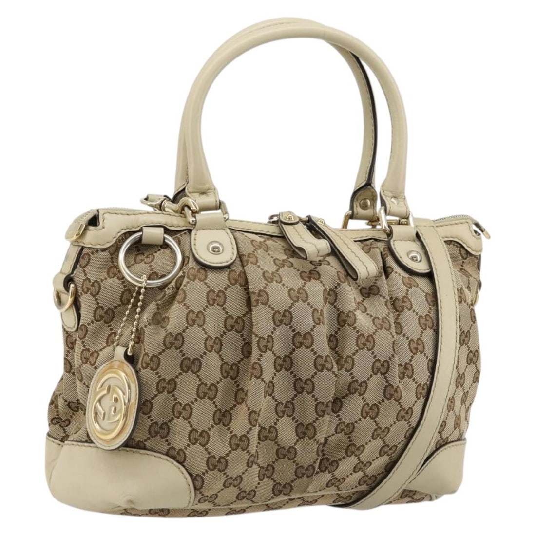Gucci Beige Gold GG Canvas 2way Handbag with Shoulder Strap: Gucci Beige Gold GG Canvas 2way Handbag with Shoulder Strap This Gucci GG Canvas 2-way handbag features a beige and gold exterior crafted from signature GG canvas. Designed for versatility, it include