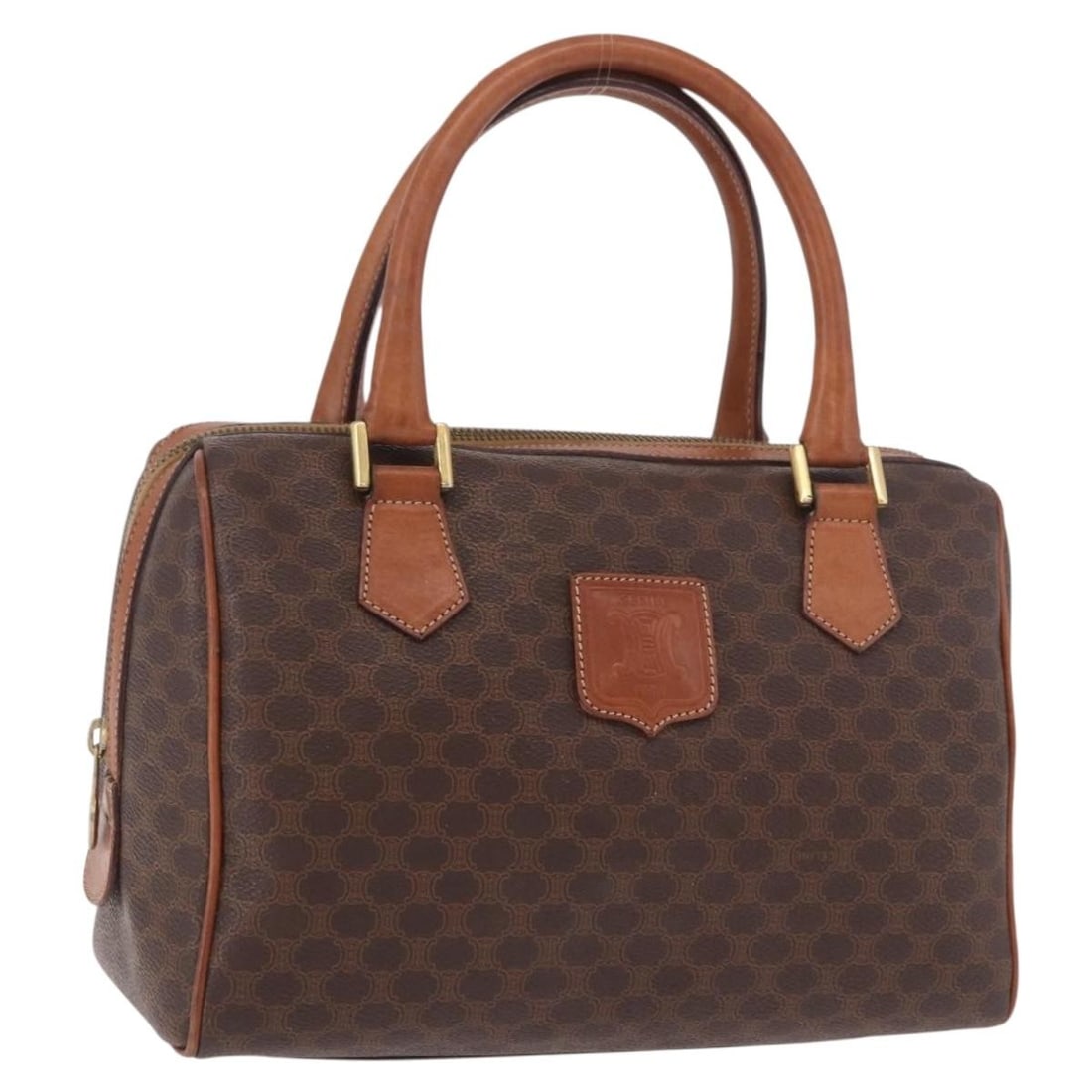 CELINE Macadam Boston Bag Brown PVC Leather Italy: CELINE Macadam Boston Bag Brown PVC Leather Italy This CELINE Boston bag is crafted from PVC leather and Macadam canvas in a brown and gold colorway. It was made in Italy and measures approximately 25