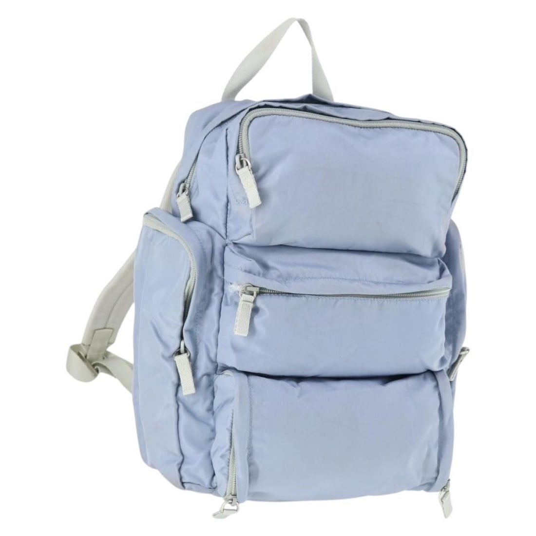 Prada nylon light blue silver backpack Italy women: Prada nylon light blue silver backpack Italy women This PRADA women's backpack is crafted from durable nylon in a light blue and silver color scheme. Made in Italy, it features a spacious interior sui