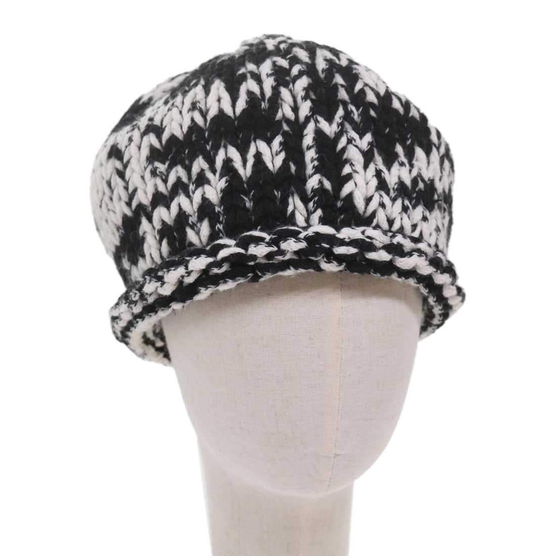 CHANEL Coco Mark Wool Knit Women's Hat Black White: CHANEL Coco Mark Wool Knit Women's Hat Black White A CHANEL knitted wool hat in black and white, designed for women and made in Italy. The item is described as heavily used with visible surface rubbin
