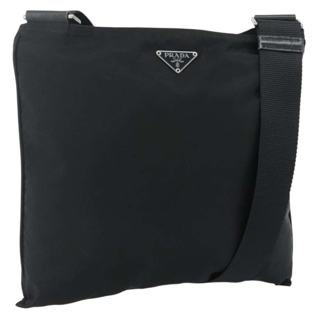 PRADA Nylon Shoulder Bag in Black with Silver Tone Hardware: PRADA Nylon Shoulder Bag in Black with Silver Tone Hardware Authentic Prada shoulder bag in black nylon with silver-tone accents. Made in Italy, this women's bag has a simple shoulder bag silhouette a