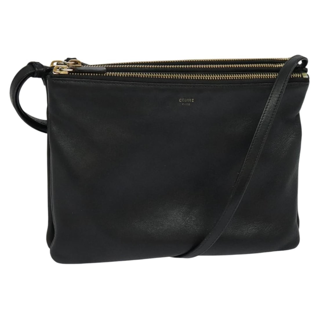 Celine Trio Leather Shoulder Bag Black with Gold Tone Hardware: Celine Trio Leather Shoulder Bag Black with Gold Tone Hardware This CELINE Trio shoulder bag is crafted from leather in black with gold-tone hardware. It features a compact silhouette with a shoulder 