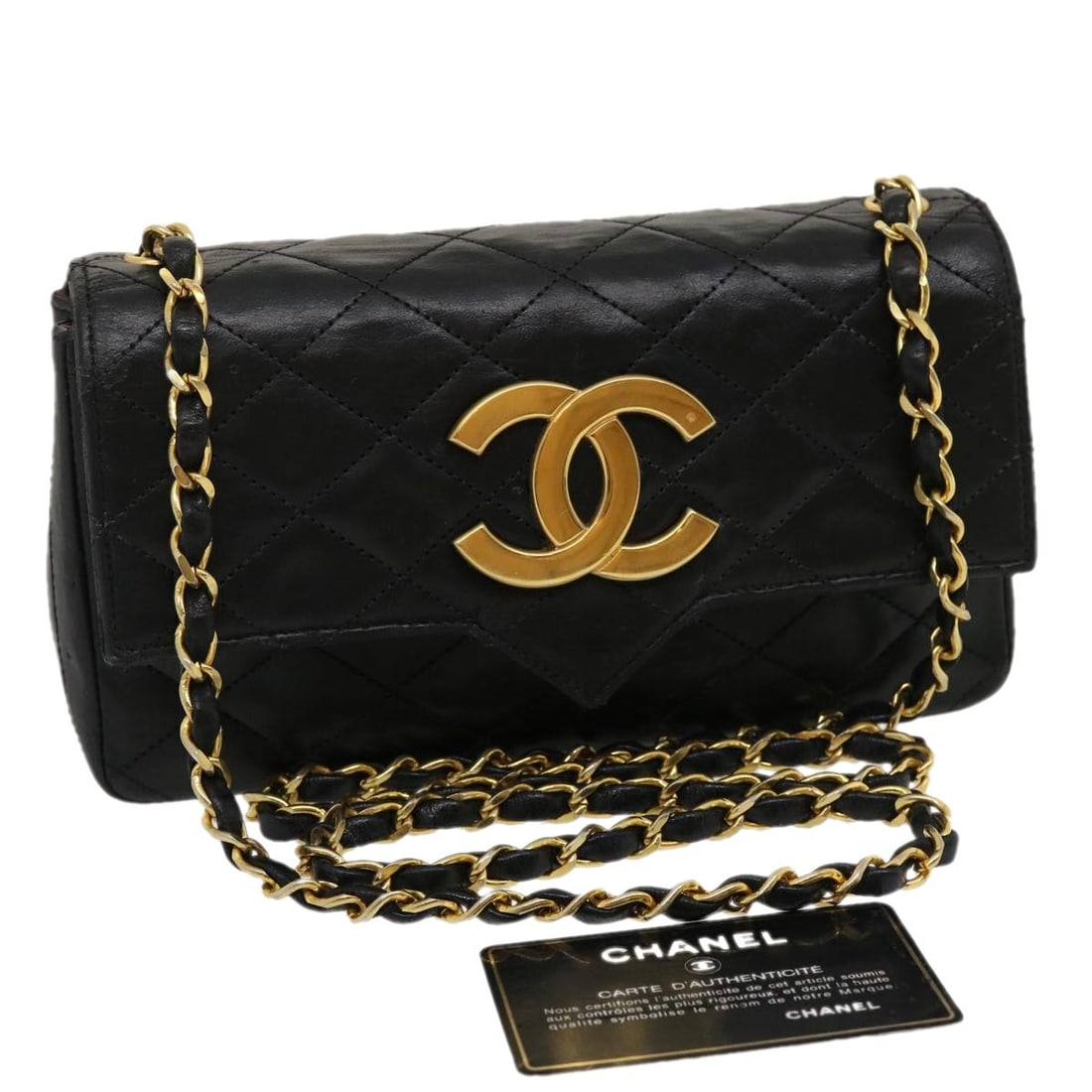 Black Lambskin Shoulder Bag CHANEL Matelasse CC Gold Tone: Black Lambskin Shoulder Bag CHANEL Matelasse CC Gold Tone A CHANEL Matelasse shoulder bag in black lamb skin with gold-tone details. It comes with a guarantee card and was made in France. The bag show
