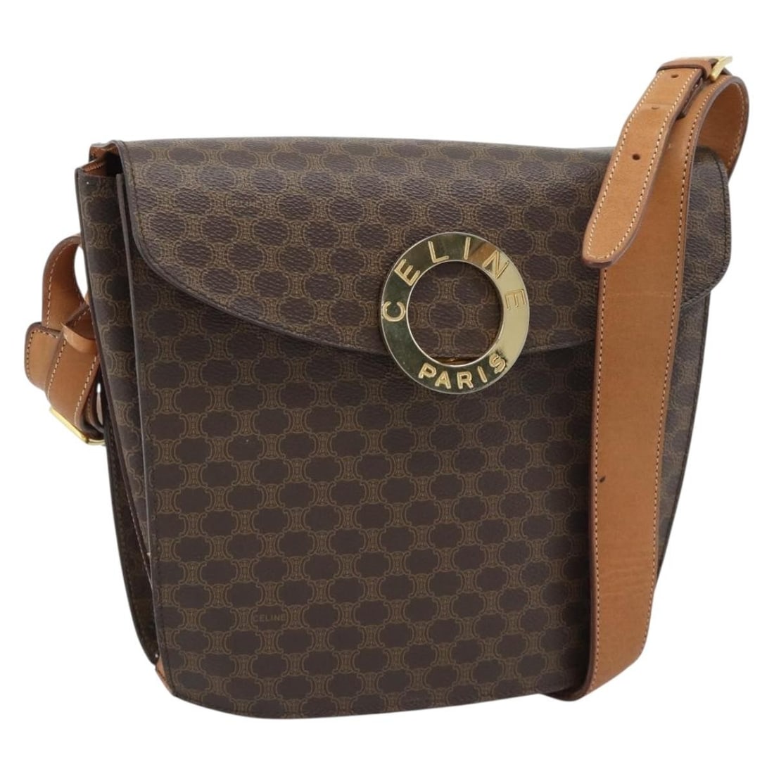 Celine Macadam Canvas PVC Leather Round Shoulder Bag Brown Gold: Celine Macadam Canvas PVC Leather Round Shoulder Bag Brown Gold A CELINE shoulder bag in brown and gold, made from PVC leather and Macadam canvas. It has a circular silhouette with a shoulder strap an