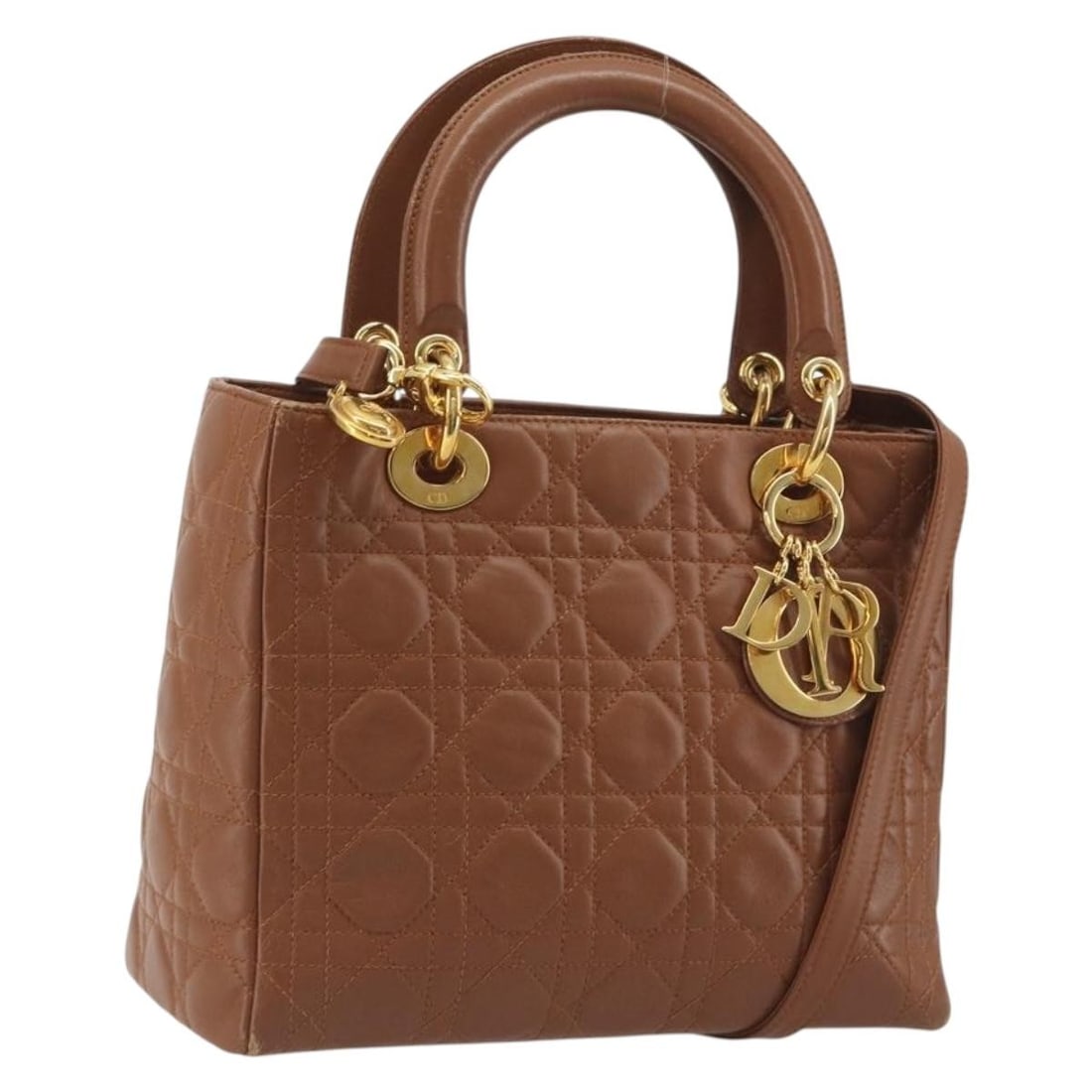 Christian Dior Lady Dior lambskin 2way handbag brown with strap charm: Christian Dior Lady Dior lambskin 2way handbag brown with strap charm Christian Dior Lady Dior Canage hand bag in lamb skin with a brown and gold colorway. This 2-way bag is made in Italy and comes wi