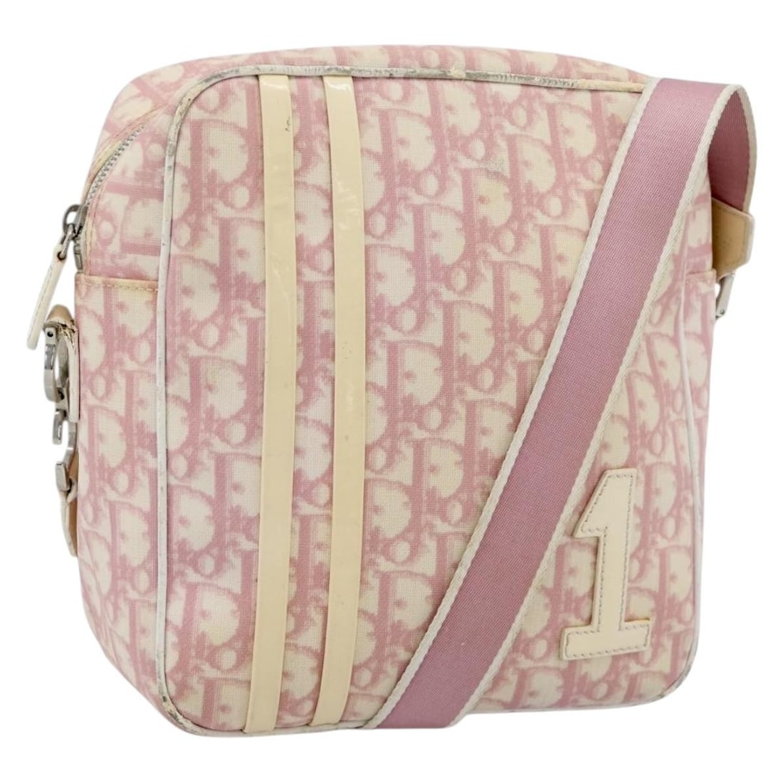Christian Dior Trotter Pink PVC Canvas Shoulder Bag Silver Tone: Christian Dior Trotter Pink PVC Canvas Shoulder Bag Silver Tone A Christian Dior Trotter canvas shoulder bag in pink and silver, made in Italy. It features PVC leather and Trotter canvas construction 