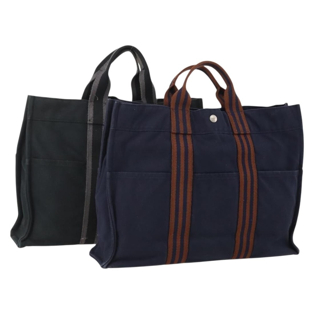 2 Hermes Fourre Tout Cotton Handbags Black Navy France: 2 Hermes Fourre Tout Cotton Handbags Black Navy France A Hermes Fourre Tout hand bag set in black and navy cotton, made in France. This special set sale is offered as-is and includes only the item sho